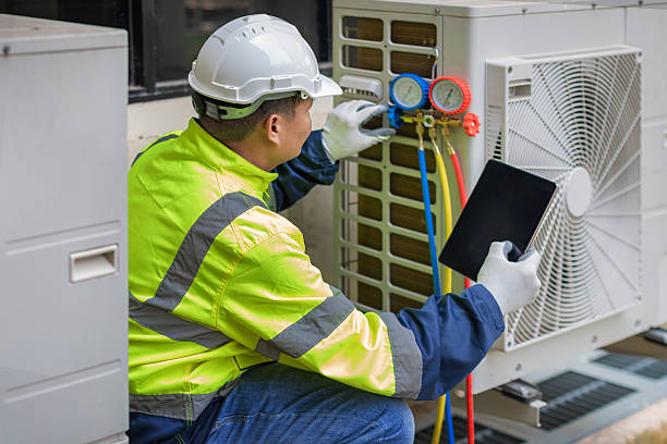 Professional Heat Pump Repair technician working in Fairland, OK
